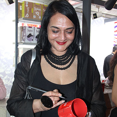 Designer Poonam Bhagat Signing Typhoo Tea Mug at her after show party at Typhoo Tea Bar at Amazon India Fashion Week 2015