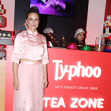 Creative minds deserve a much needed boost and that is why hairstylist Adhuna Akhtar could not miss having a sip of Typhoo to pep up her busy schedule Lakme Fashion Week