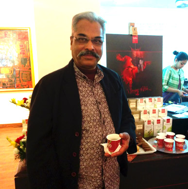 Artist Amitava Das savours Typhoo Green Tea at Aakriti Art Gallery.