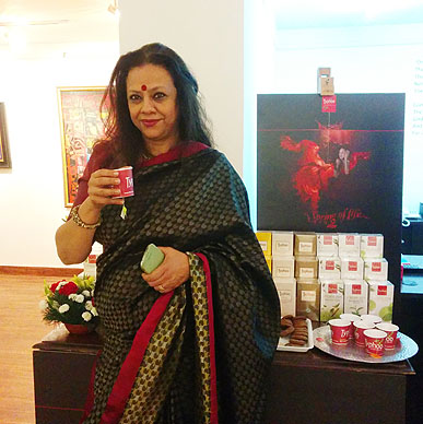 Art curator Ina Puri relishing Typhoo Tea at Aakriti Art Gallery.